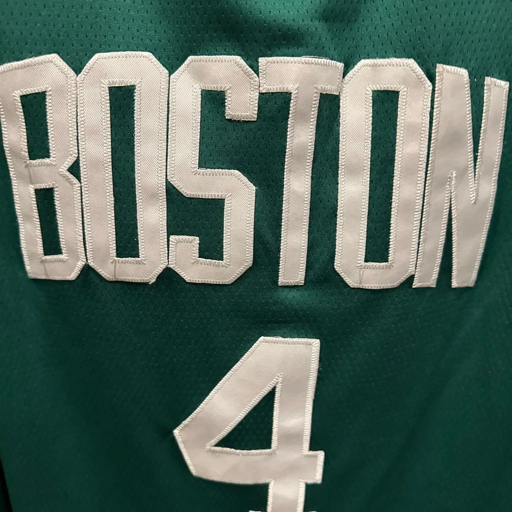 Nike Green Boston Basketball Jersey with White Accents